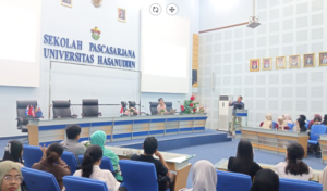 University lecture hall with speaker and audience