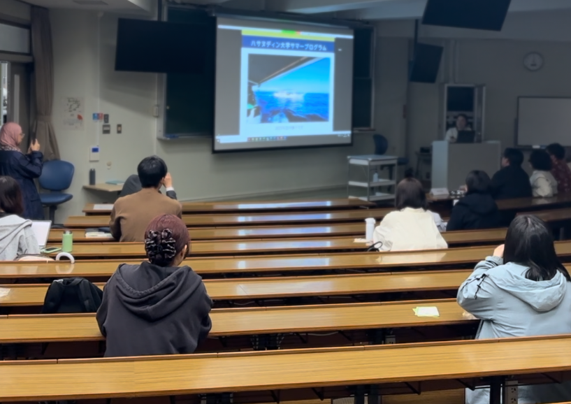 Students attending lecture in university classroom