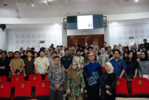 Large group of students posing in auditorium