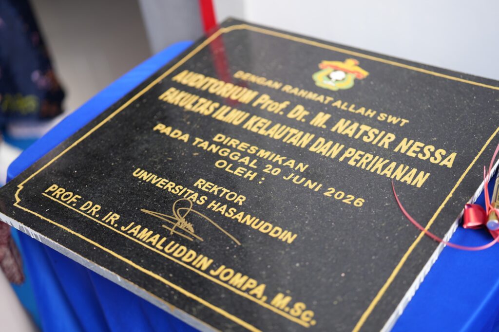 Commemorative inauguration plaque with gold lettering on black stone