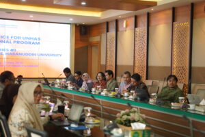 University panel meeting in modern conference room