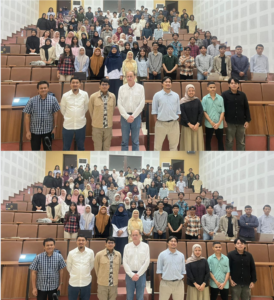 University class group photo in lecture hall