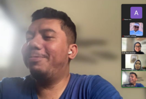 Man smiling during online video conference call