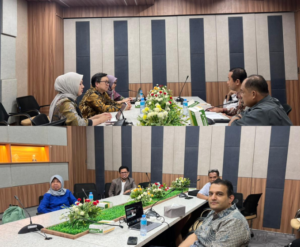 Business meeting in modern conference room with floral centerpiece
