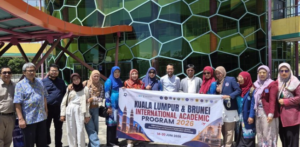 Group holding Kuala Lumpur academic program banner
