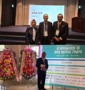 Conference attendees posing at academic event in Korea