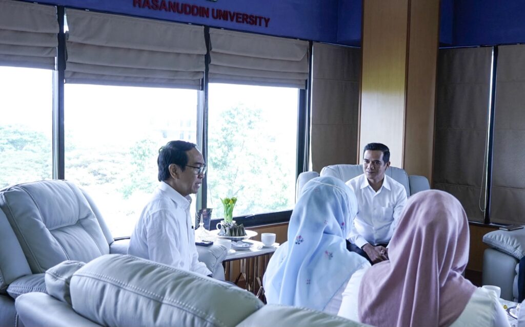 University officials meeting in office lounge