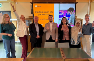 Group posing at non-EU partnership presentation