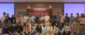 Conference group photo in front of heritage banner
