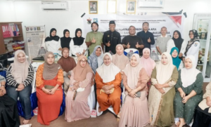 Group portrait of community members at indoor event