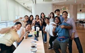 Group of young adults posing indoors