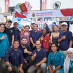 Group photo at Hasanuddin University international office booth