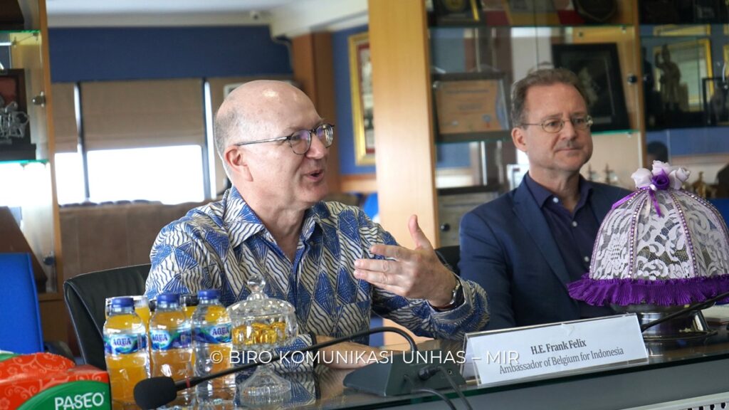 Belgian ambassador speaks at a meeting table